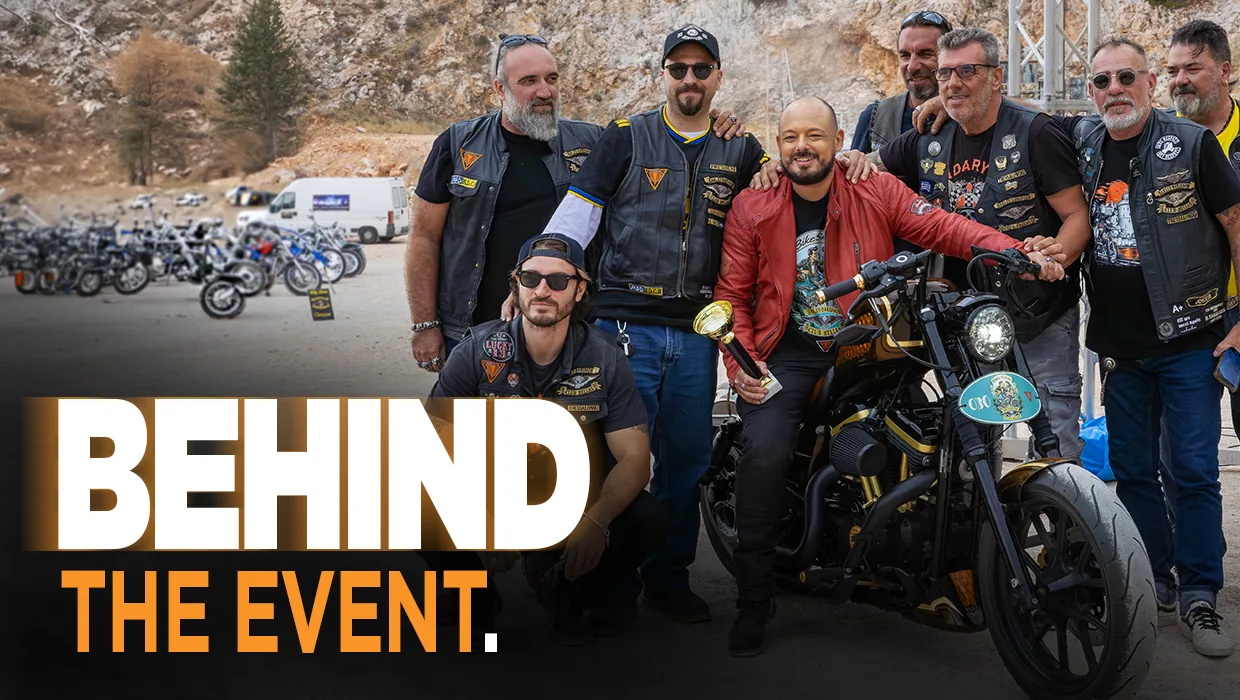 Harley-Davidson Club Hellas Bike Show participants posing beside a motorcycle, with Behind the Event headline