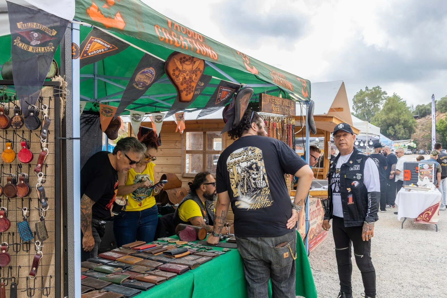 Trophy presentation beside a black custom motorcycle